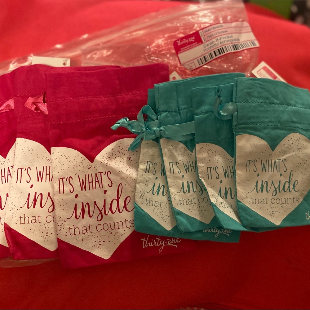 Thirty one jewelry pouch set of 7